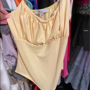 YELLOW BODYSUIT NEVER WORN